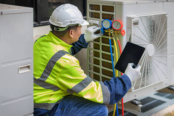 Professional Heat Pump Repair technician working in Pine Hill, NJ